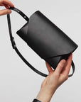 Versatile Leather Clutch Wallet with Adjustable Strap