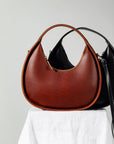 Mini Moon Sling Bag – Elegant & Versatile Leather Accessory by Craftory at brixbailey.com