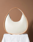 Mini Moon Sling Bag – Elegant & Versatile Leather Design by Craftory at brixbailey.com