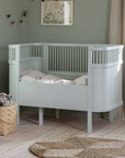 Luxury Sebra mist green cot bed, premium adjustable baby to junior bed, handcrafted non-toxic beech wood by Ella James at brixbailey.com
