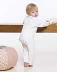 Luxury bunny embroidered babygrow with pompom tail, soft cotton jersey, delicate pink picot trim, newborn to 12 months by Ella James at brixbailey.com