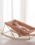 Premium baby bouncer in natural beech wood with organic cotton cover, stylish and safe, EN 12790 certified, perfect for newborns up to 9kg by Ella James at brixbailey.com