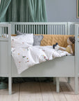 Luxury Sebra mist green cot bed, convertible baby to junior bed, premium beech wood, non-toxic paint, height-adjustable base, removable side panels by Ella James at brixbailey.com