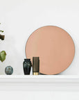 Luxury Danish rose gold tint mirror, classic design with warm atmospheric glow by Ella James at brixbailey.com