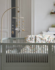 Luxury Sebra mist green cot bed, convertible baby to junior bed, premium beech wood, non-toxic paint, height-adjustable base, removable side panels by Ella James at brixbailey.com