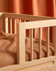Luxury Nobodinoz solid oakwood junior bed, premium handcrafted transition bed for kids, stylish low-level design with adjustable height by Ella James at brixbailey.com
