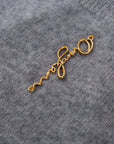 Sleeveless Jumper with Golden Metal Logo