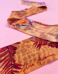 Peach botanical 'Panthera' skinny Silk scarf, delicate, lightweight Twilly style scarf accessory with animal print texture