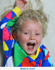 Luxury premium Toby Tiger sleepwear with hand-drawn heart print on light blue organic cotton, soft yellow trim, best-selling kids pajamas by Toby Tiger at brixbailey.com