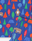 Premium organic cotton kids pajama set, cozy two-piece with camping bear print, soft GOTS-certified fabric, snap buttons, eco-friendly dyes by Toby Tiger at brixbailey.com