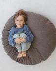 The MINICAMP Bouclé Fabric Kids Floor Cushion in Grey - Cozy & Stylish for Playtime by Minicamp at brixbailey.com