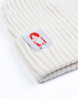 White Beanie with Red Cross Detail