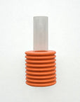close-up of orange ribble wall vase with metal hook for easy mounting on beige wall
