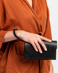 Versatile Leather Clutch Wallet with Adjustable Strap