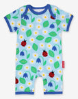 Premium summer baby romper with ladybug print, soft certified organic cotton, short legs, snap buttons, stylish and comfortable by Toby Tiger at brixbailey.com