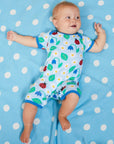 Premium baby summer romper with ladybug print in soft blue, certified organic cotton, short legs, snap buttons by Toby Tiger at brixbailey.com