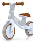 a soft-focus shot of the velo balance bike's comfortable seat and non-slip grips, ready for a toddler's first ride