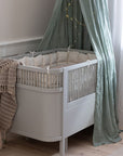 Premium Sebra baby and junior cot bed in stylish stone grey, luxury handcrafted beech wood, adjustable height, non-toxic paint by Ella James at brixbailey.com