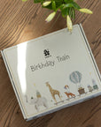 Premium Wooden Birthday Train with Animal Parade, Elephant and Candle Holders, Stylish Scandinavian Decor, Handcrafted Gift Box by Ella James at brixbailey.com
