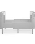 Premium Sebra baby and junior cot bed in stylish stone grey, luxury beech wood design with adjustable mattress and height-adjustable base by Ella James at brixbailey.com