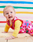 Premium baby romper with colorful dinosaur unicorn elephant print, organic cotton short sleeve bodysuit, easy-change snap buttons, soft sustainable fabric by Toby Tiger at brixbailey.com