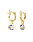 Shine On huggie hoop earrings with star charm and blue gold leaf Murano glass bead, luxury stacking jewelry, best-selling dainty huggies by Lezzeri at brixbailey.com
