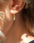 Luxury blue and gold Murano glass bead huggie hoop earrings with star charm, best-selling Shine On collection by Lezzeri at brixbailey.com
