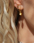Shine On gold vermeil huggie earrings with star charm and Murano glass bead, luxury lightweight stacking hoops by Lezzeri at brixbailey.com