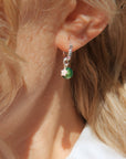 Shine On Huggie Earrings with star charm and green gold leaf Murano glass bead, sterling silver, luxury lightweight stacking hoops by Lezzeri at brixbailey.com