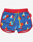 Premium organic sailboat print shorts, 100% GOTS certified cotton, red trim, adjustable yellow drawstring, stylish summer wear by Toby Tiger at brixbailey.com