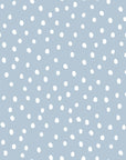 playful light blue irregular dots wallpaper for a kids room, close-up on whimsical pattern