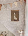 bold chic powder pink and white irregular dots wallpaper on a feature wall