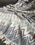Luxury Sirocco organic cotton jacquard weave throw, oversized 200x250cm, soft muted zigzag pattern, premium bedspread or picnic blanket by Wildash London at brixbailey.com