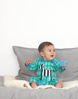 Playful Zebra Print Organic Cotton Sleepsuit with Slip Neck and Snap Buttons by Toby Tiger at brixbailey.com