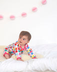 Premium Red Printed Organic Cotton Baby Sleepsuit with Toby Tiger Design, GOTS Certified and Eco-Friendly by Toby Tiger at brixbailey.com