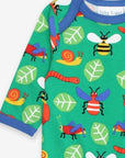 Premium baby sleepwear, organic cotton insect print pajamas, soft GOTS-certified, blue trim, snap buttons, machine washable by Toby Tiger at brixbailey.com