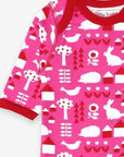 Premium organic cotton pajama set with garden print, stylish pink and red trim, slip-on neckline, snap buttons, GOTS certified by Toby Tiger at brixbailey.com