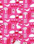 Premium organic cotton pajama set with garden print, stylish rose and red trim, slip-on neckline, snap buttons, GOTS certified, Toby Tiger design by Toby Tiger at brixbailey.com