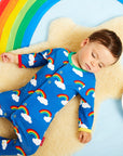 Rainbow Print Organic Cotton Baby Sleepsuit with Feet and Snap Buttons for Easy Diaper Changes by Toby Tiger at brixbailey.com