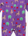 Premium organic cotton baby sleep suit with cozy horse and apple design, closed feet for warmth by Toby Tiger at brixbailey.com