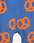 Premium Dark Blue Organic Cotton Baby Wrap with Pretzel Print and Snap Buttons for Easy Diaper Changes by Toby Tiger at brixbailey.com