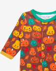 Premium baby pumpkin print organic cotton footed pajamas, cozy autumn sleepwear with snap buttons, GOTS certified by Toby Tiger at brixbailey.com