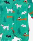 Premium organic cotton Christmas dog baby bodysuit with footies, snap buttons, cozy and stylish holiday pajamas by Toby Tiger at brixbailey.com