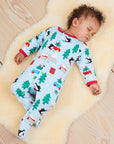 Premium GOTS Certified Organic Cotton Baby Christmas Pajamas with Penguin and Snowman Print, Easy Snap Closure, Cozy Footed Design by Toby Tiger at brixbailey.com