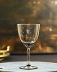four smoky crystal wine glasses with stars design