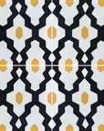 Luxury Moroccan cement tiles, blue yellow cream geometric pattern, handcrafted premium floor and wall tiles, best-selling exotic design by Maria Starling Design at brixbailey.com