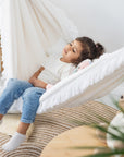 Polar Hug Hammock: The Perfect Blend of Cozy, Safe, and Stylish for Dreamy Interiors - Handmade & Child-Safe by Sówka at www.brixbailey.com
