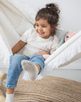 Polar Hug Hammock: Dreamy and Cozy Kids' Boucle Swing - Safe, Handmade, and Fits Any Decor by Sówka at www.brixbailey.com