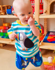Luxury organic cotton baby t-shirt with puffin applique, playful hidden fish surprise, soft striped design, GOTS certified, machine washable by Toby Tiger at brixbailey.com