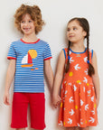 Stylish Blue and White Striped Organic Kids T-Shirt with Sailboat Applique and Red Trim by Toby Tiger at brixbailey.com